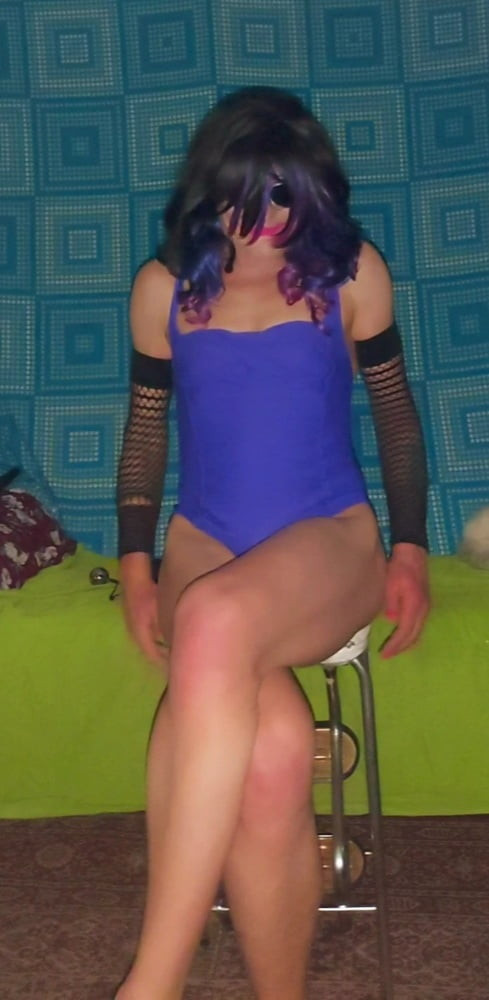 Purple swimsuit and wand album #54