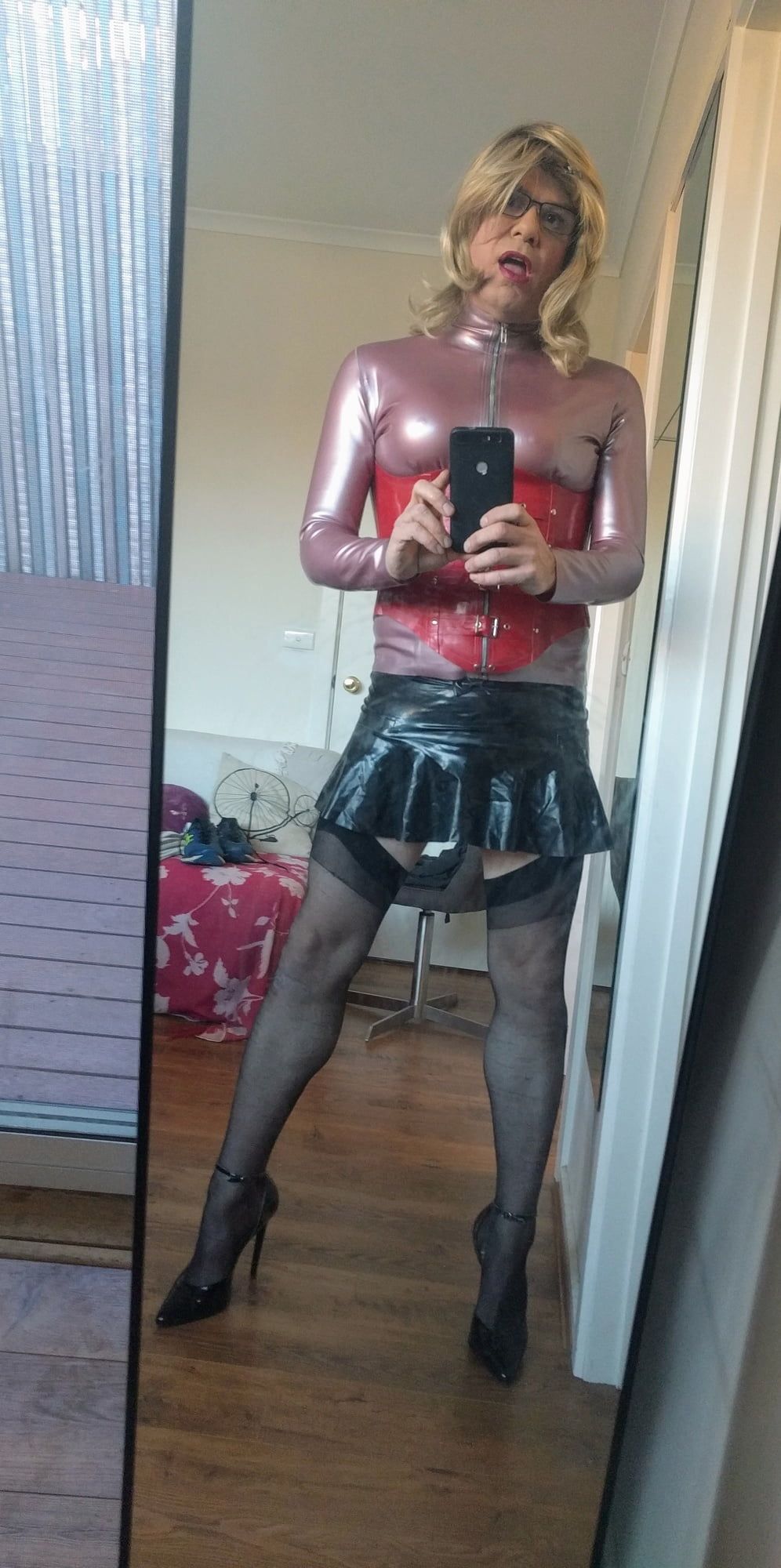 Back as a short blonde latex girl #8