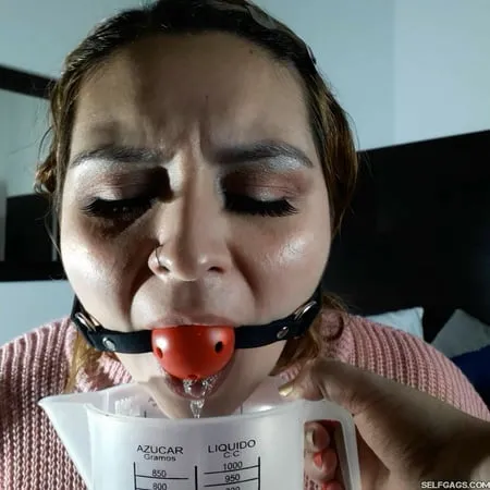 beautiful bitch ball gagged and drooling         