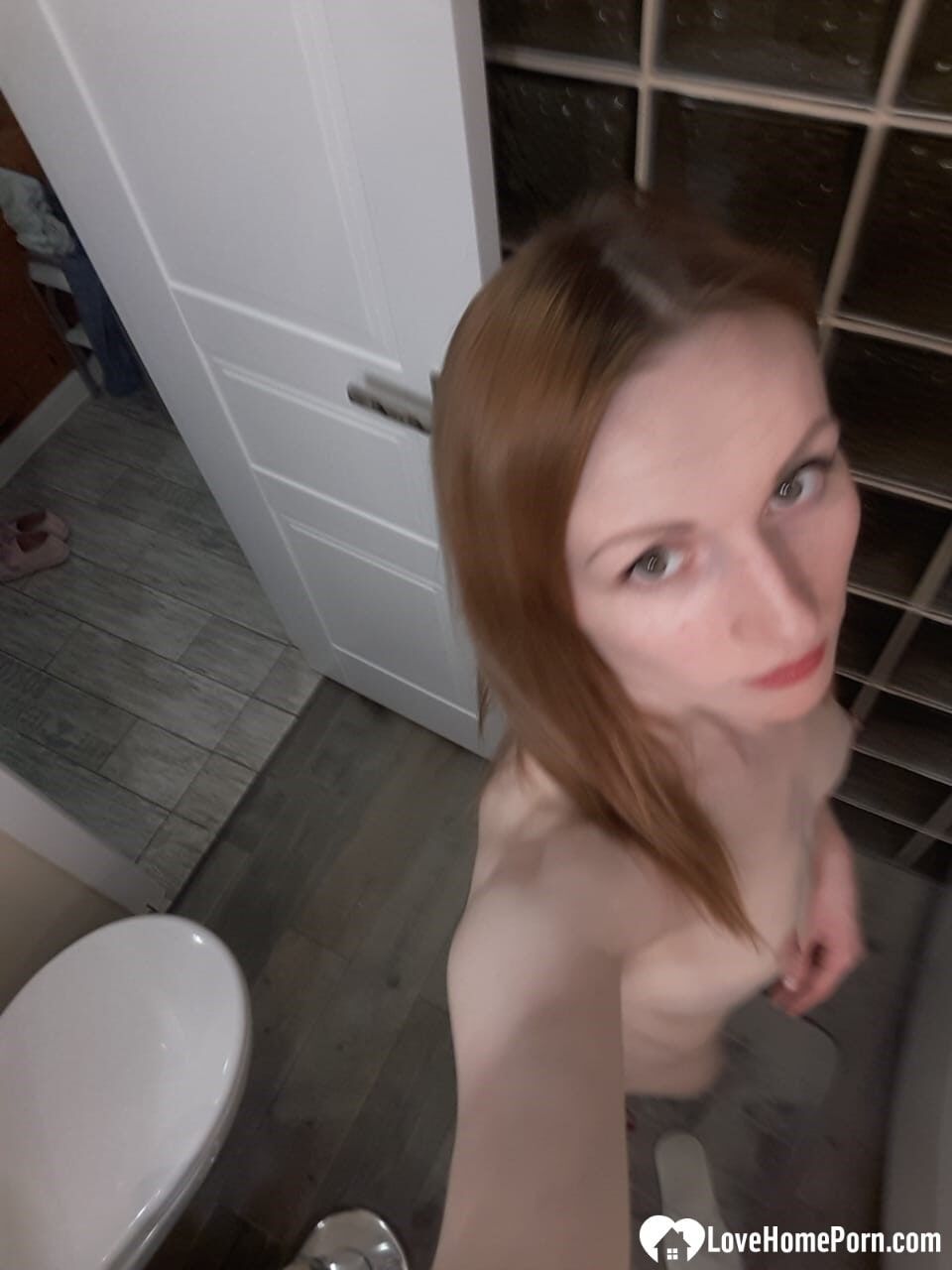 Skinny redhead girl posing in her bathroom naked #22