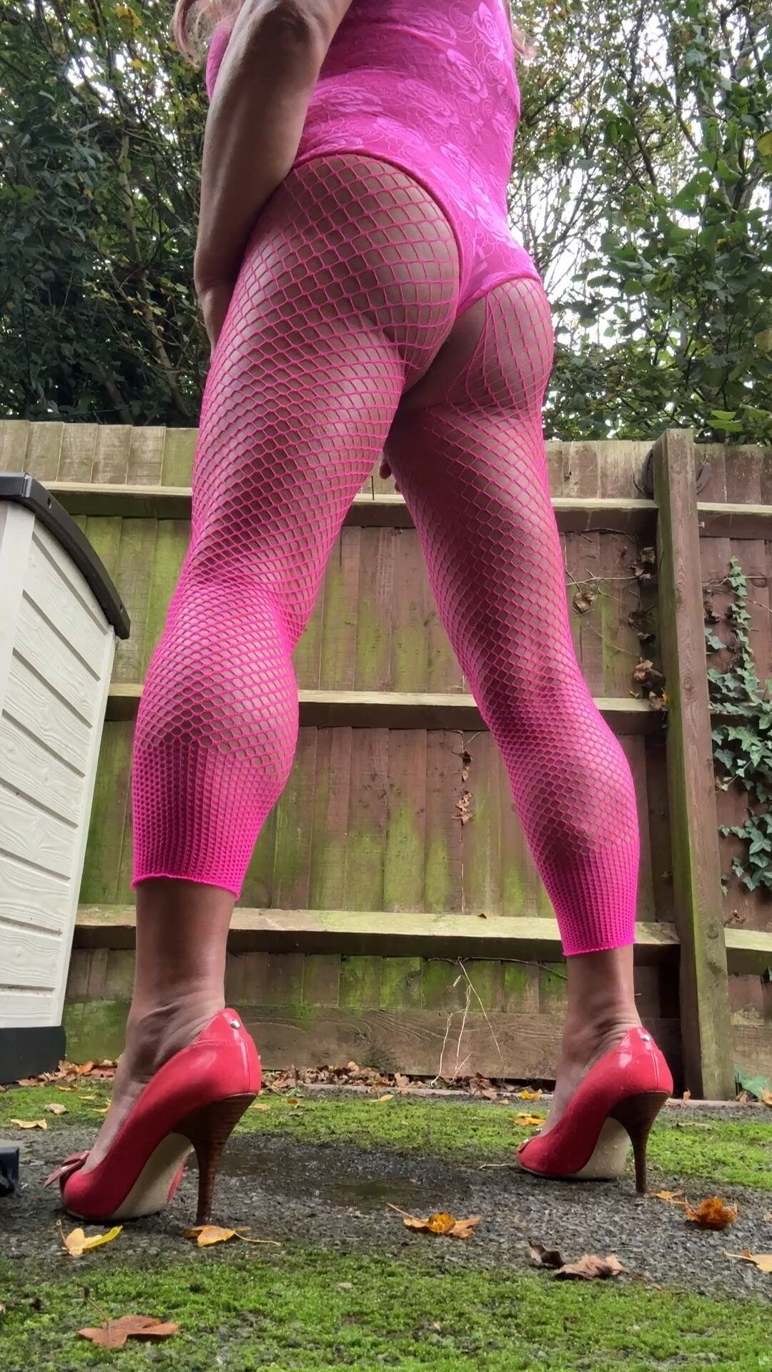 Crossdresser kellycd2022 in pink playsuit and fishnets  #31