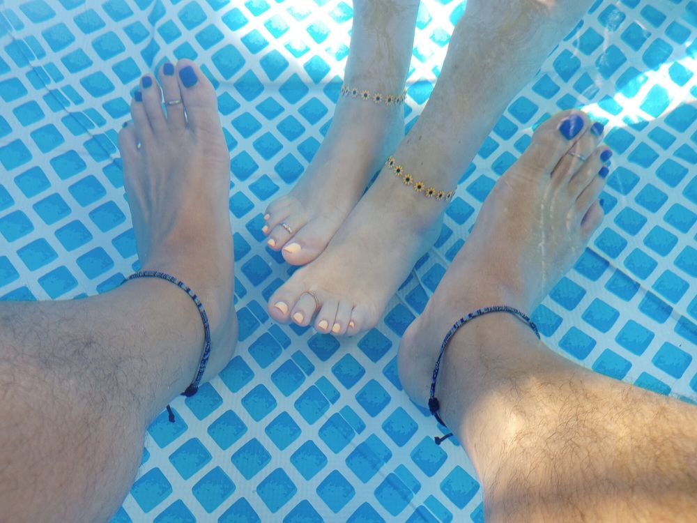 Showing off our pedicures in the pool #15