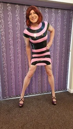 sissy lucy in latex and chastity cage         