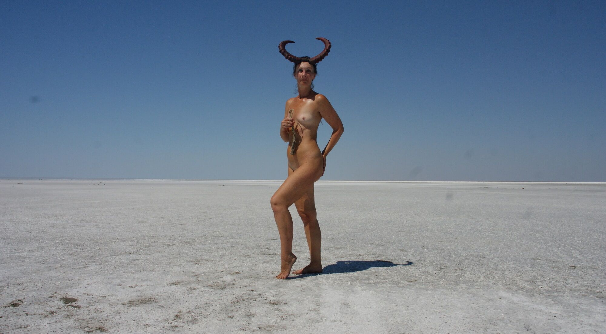 Standing naked on the salt of the salt lake Elton #28