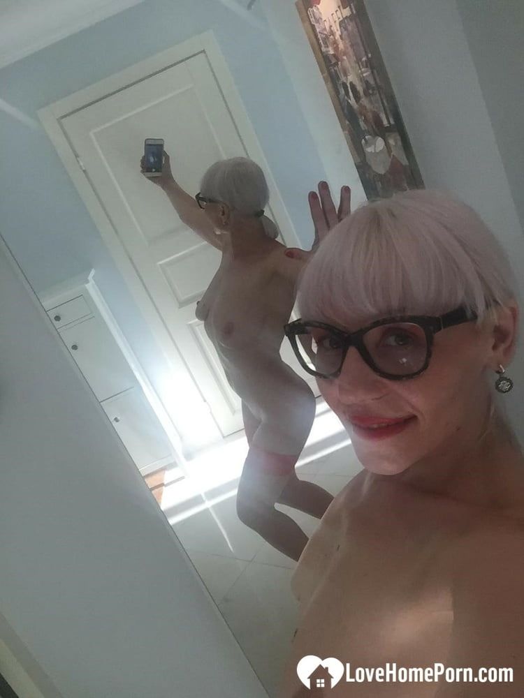 Blonde MILF with glasses teasing with nudes #24