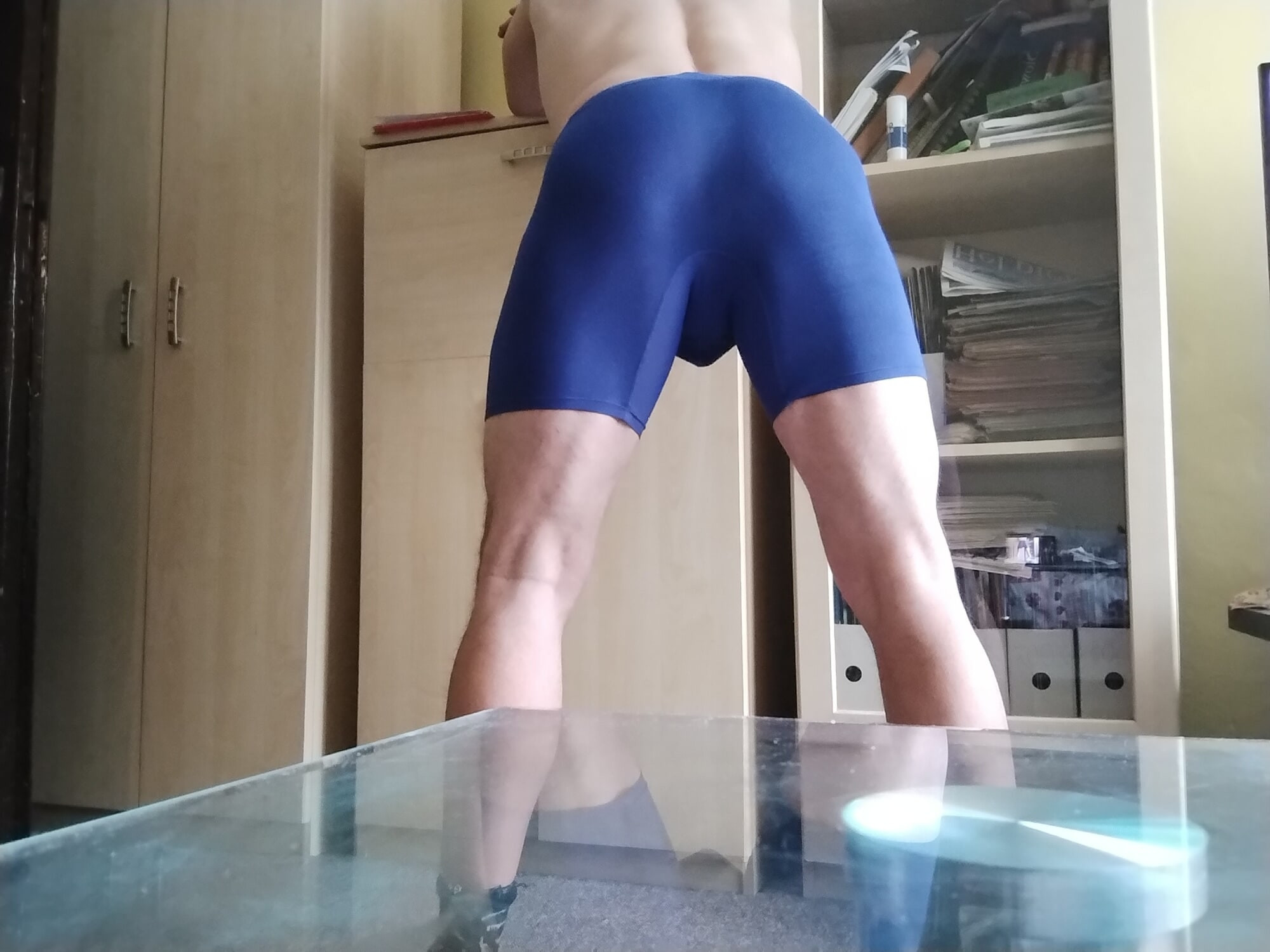 From behind