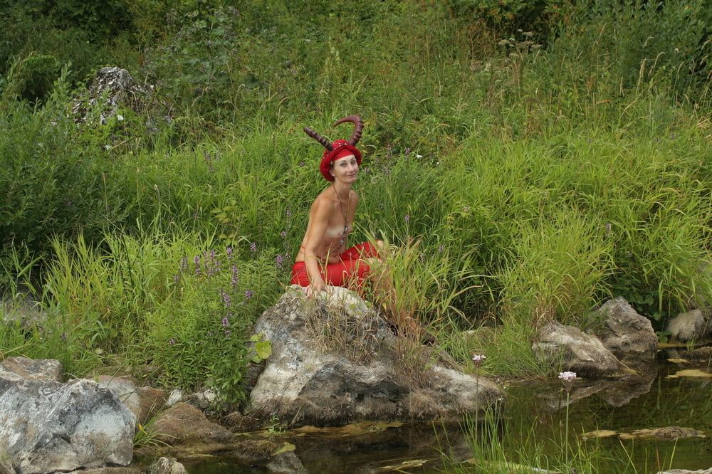With Horns In Red Dress In Shallow River #18