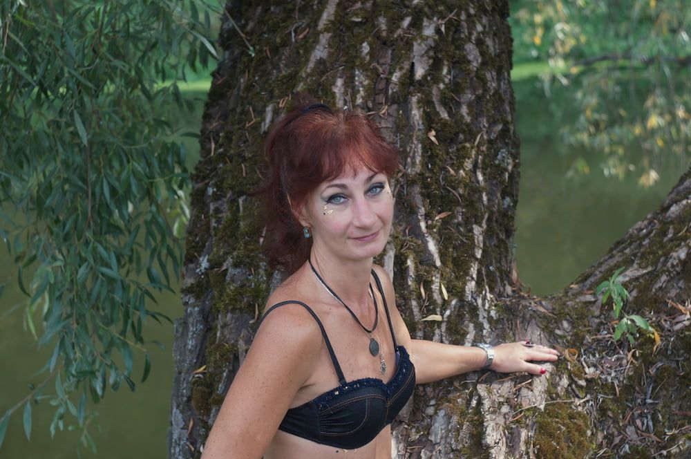Black bikini near tree upon river #3