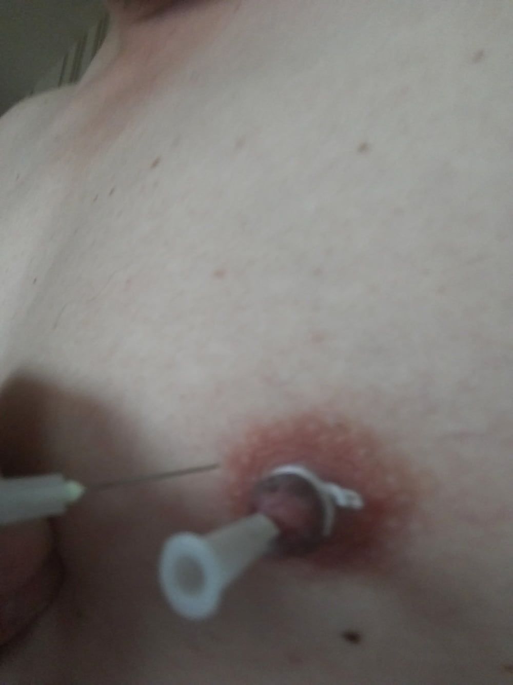 some more needles in my nipples #4