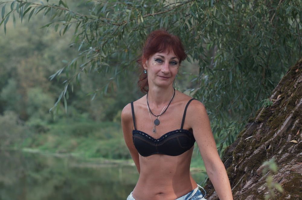 Black bikini near tree upon river #8