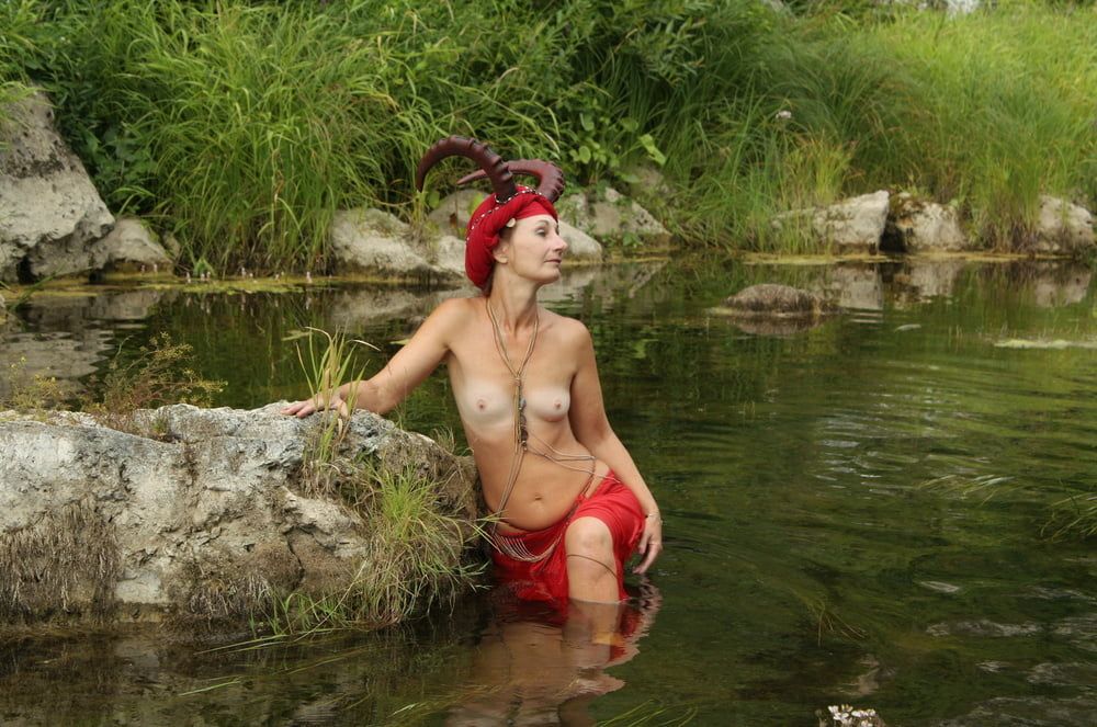 With Horns In Red Dress In Shallow River #14