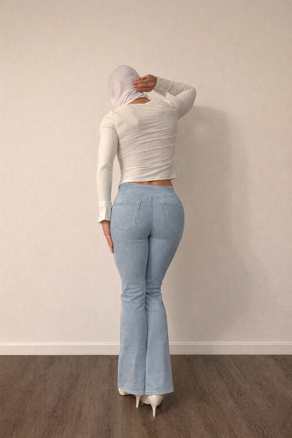 Fitted jeans, white top, pumps