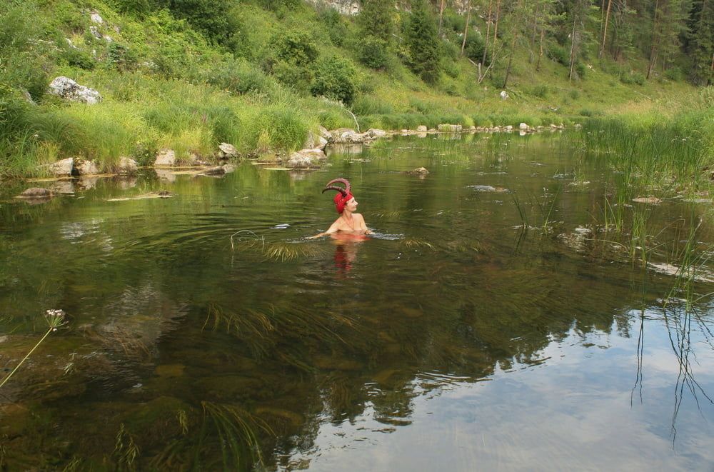 With Horns In Red Dress In Shallow River #43