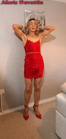    alessia travestita in red velvet dress         