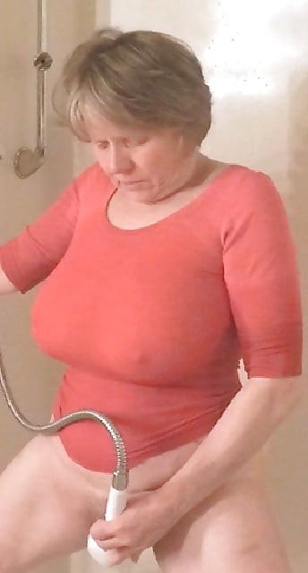 GILF masturbates in wet t-shirt #7