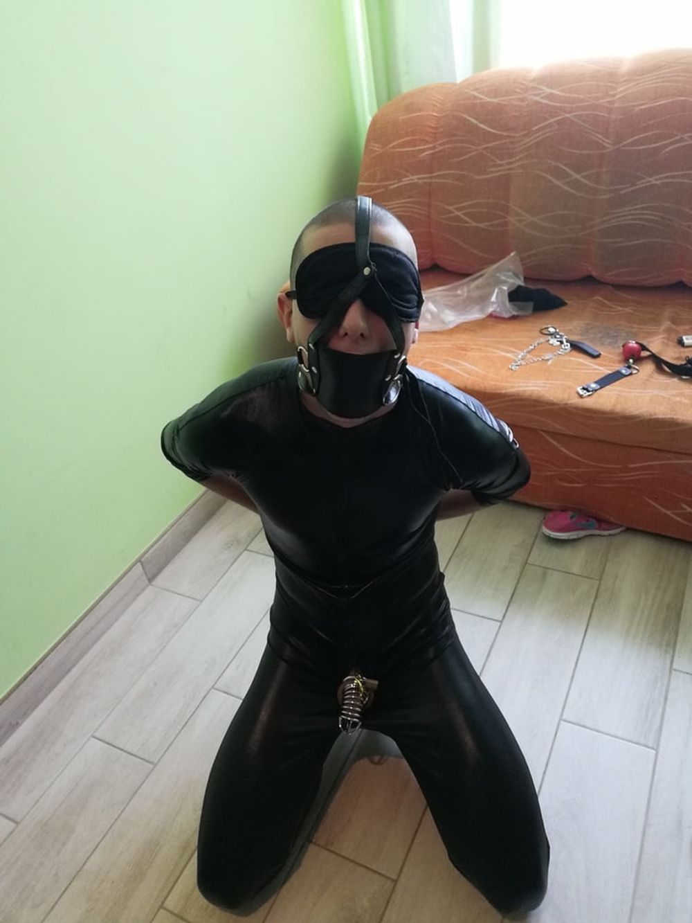 Young slave in latex and chastity cage  #17