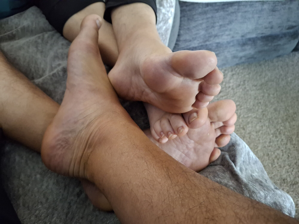 Playing footsie on the couch #8