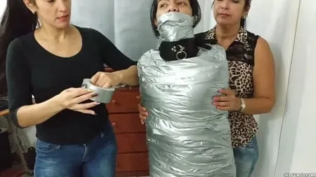 heavily duct tape mummified by crazy bondage women         