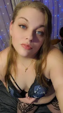 bbw playing in sexy blue lingerie and fishnets         