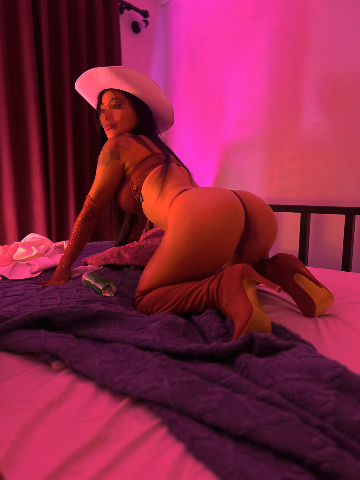 Sexy sheriff in red high-heels and lingerie