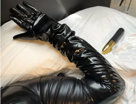 black catsuit boots corset and vibrator         