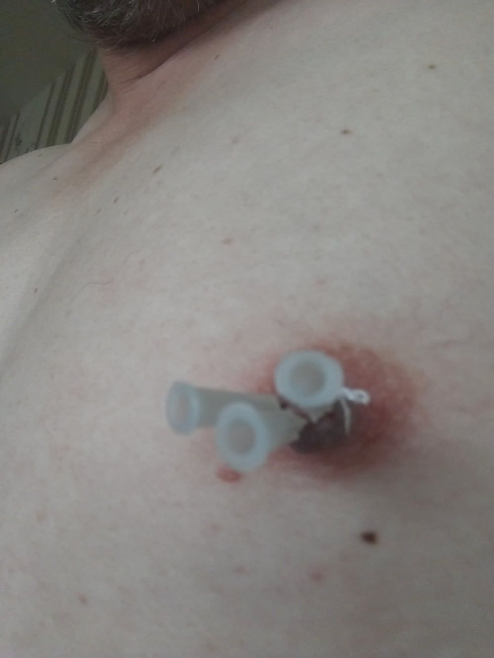 some more needles in my nipples #3