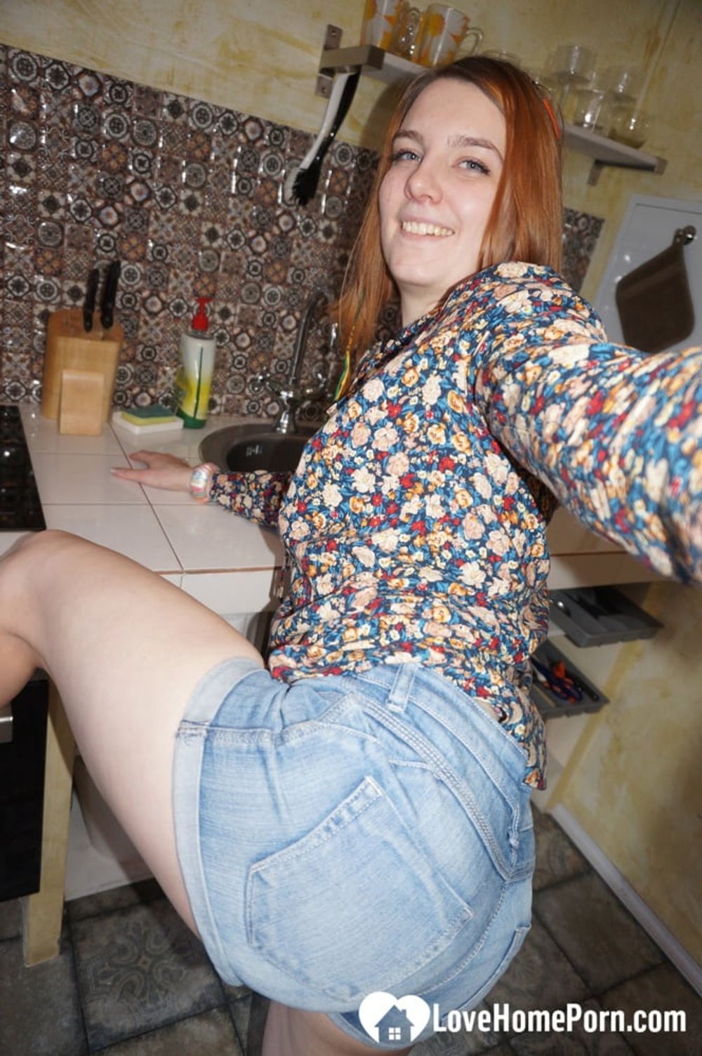 Cute redhead in socks shows off her body #7