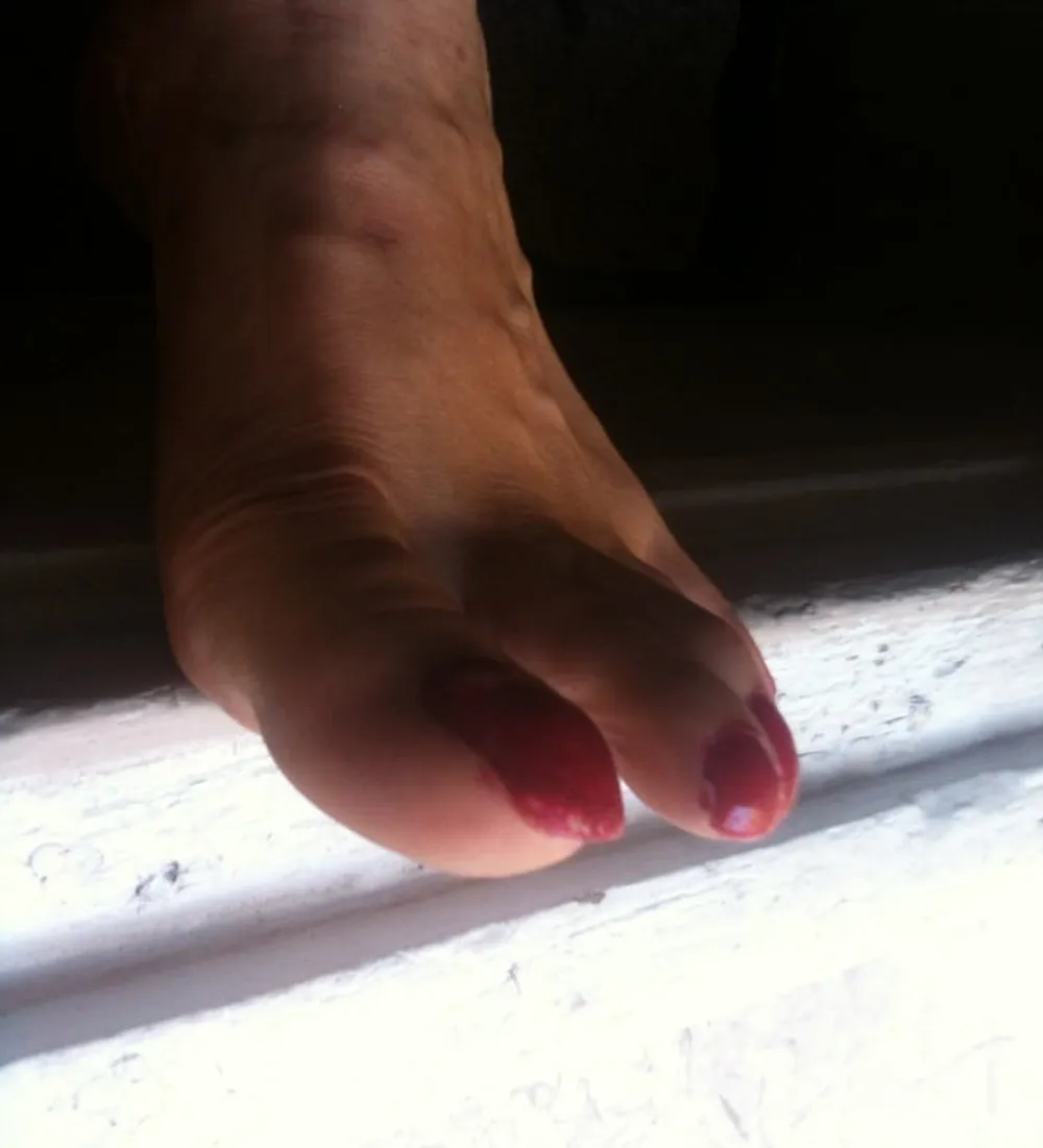 red toenails mix (older, dirty, toe ring, sandals mixed). #2