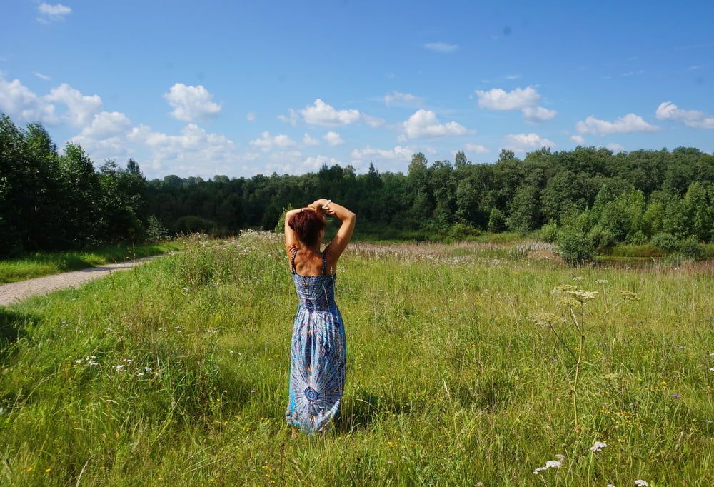 In blue dress in field #24