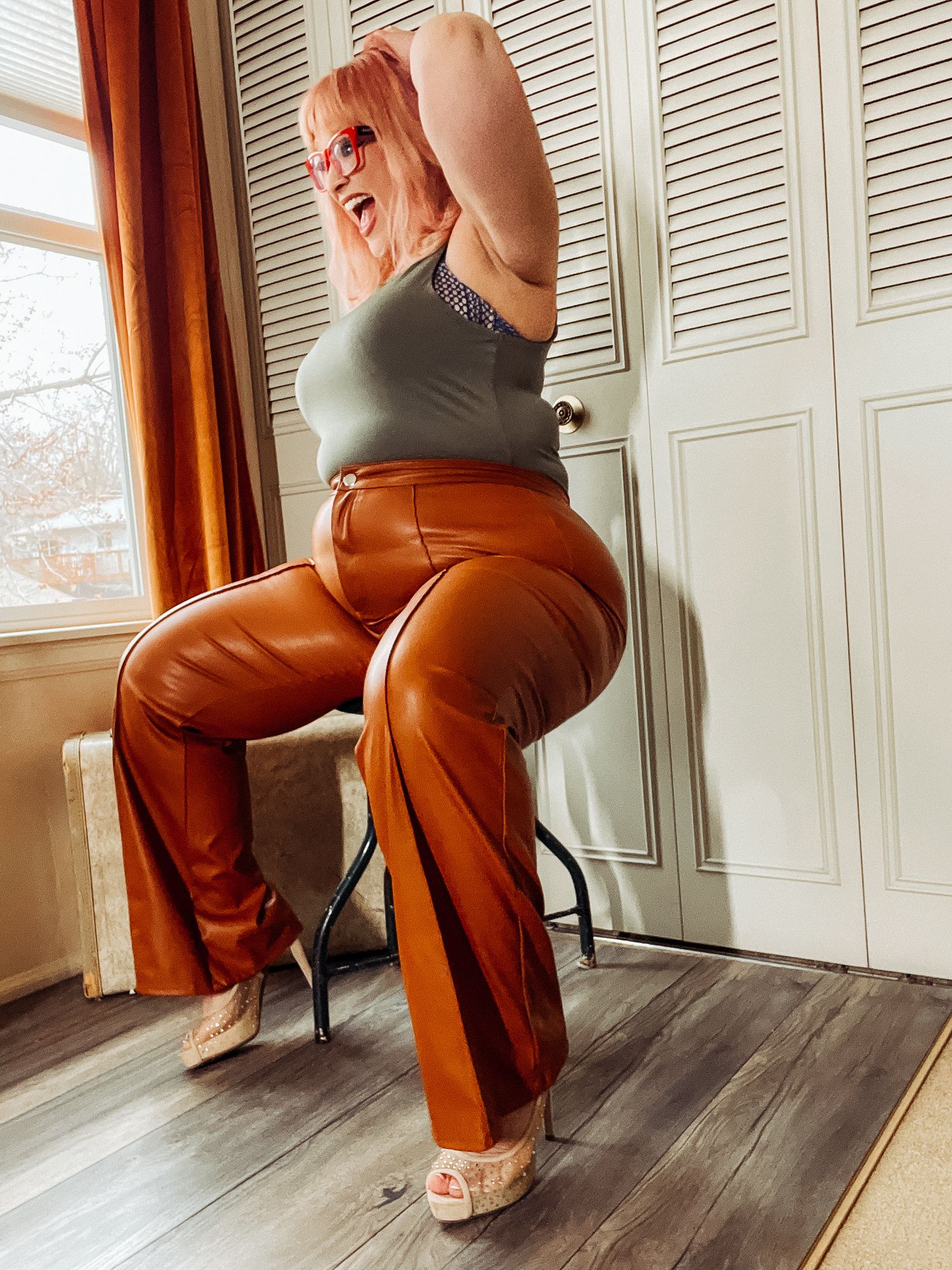 BBW in tight leather pants leans over and shows off her ass #22