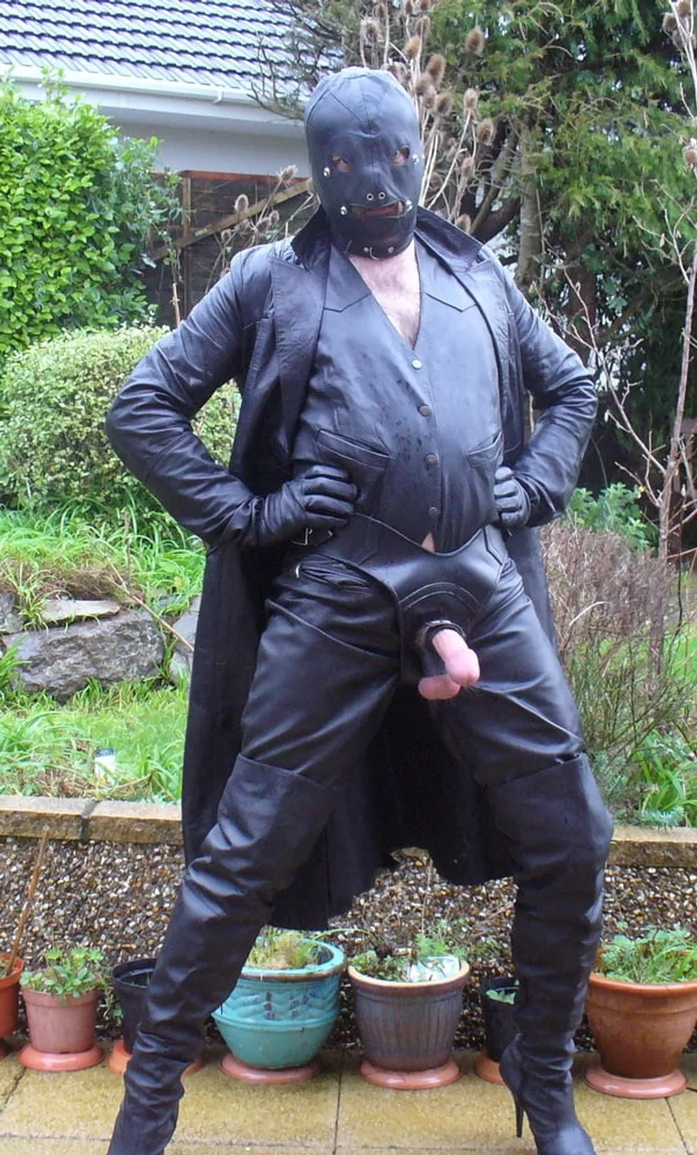 Leather Master in cock harness, boots and hood #5