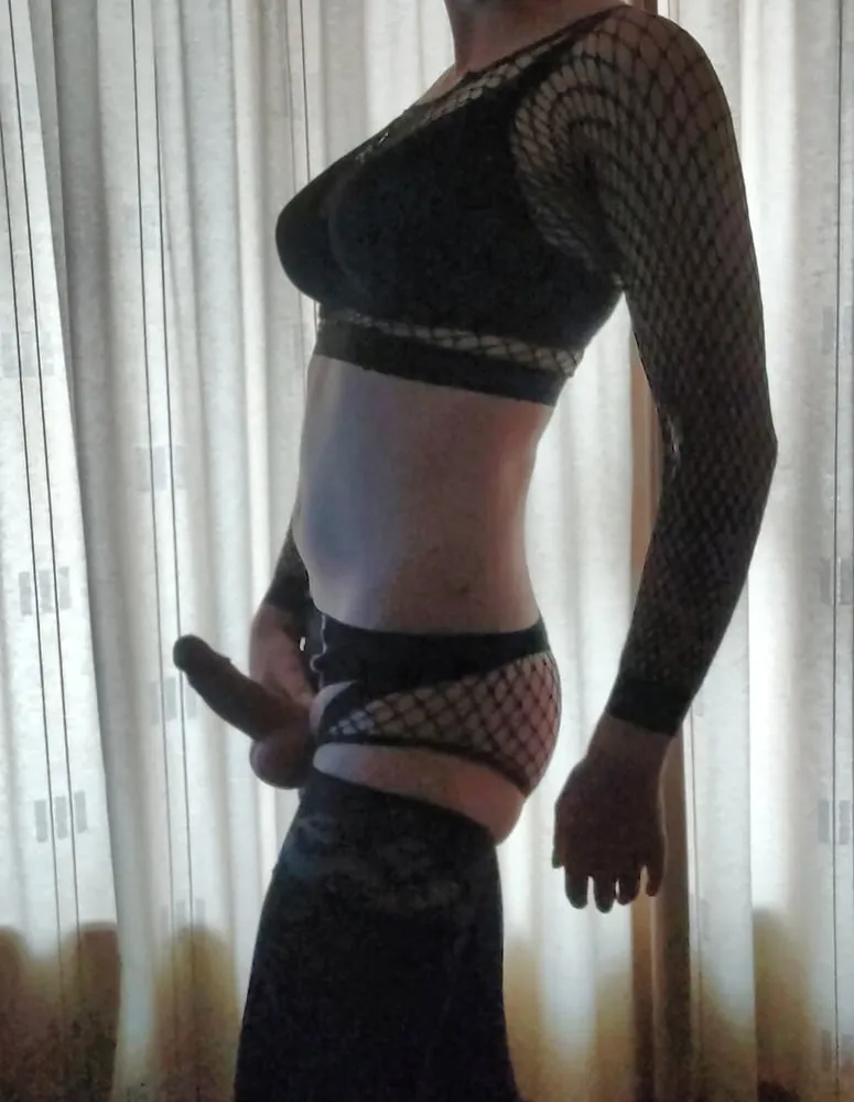 Slut CD with hard cock in fishnets