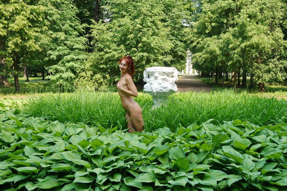 Naked in the grass by the vase #6
