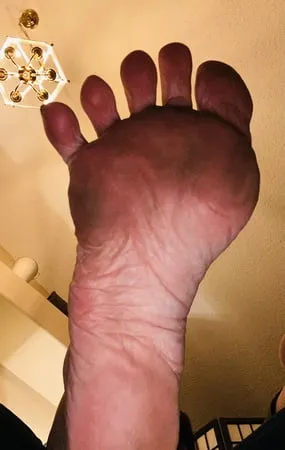 closeups dirty clean soles and toes         