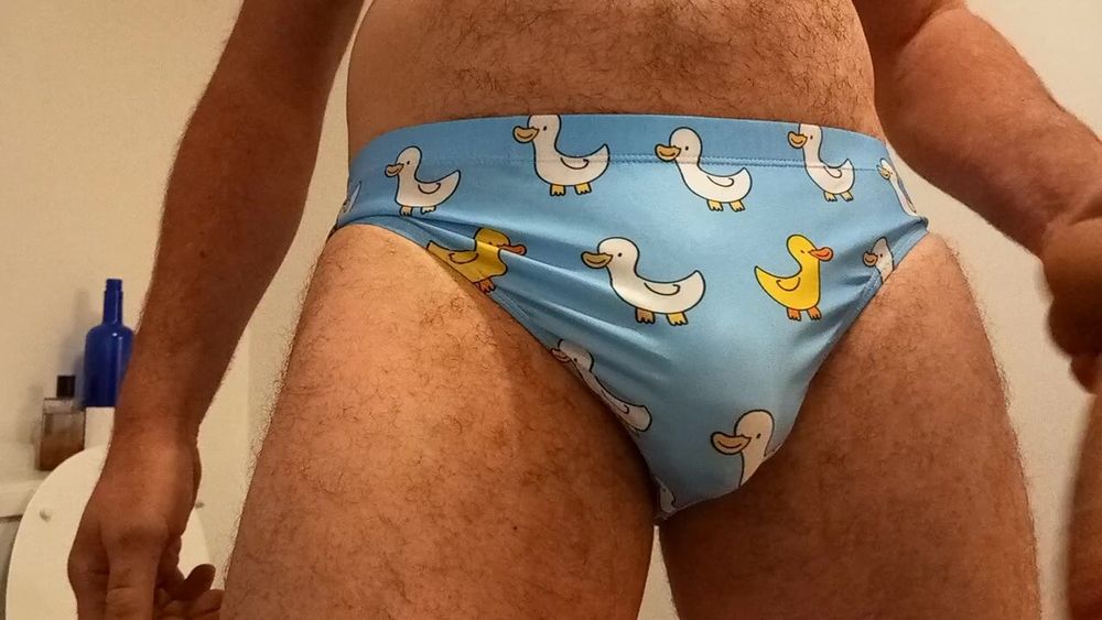 Small penis bulge cum in cute duck speedo, brief, trunks. #2