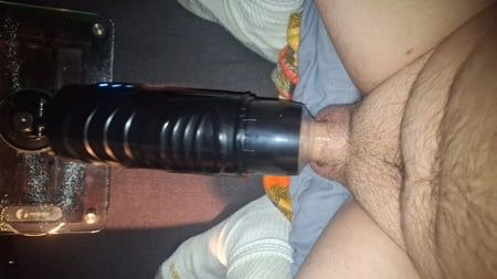 Using a male masturbator