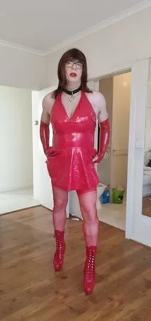 rachel wears red pvc dress         