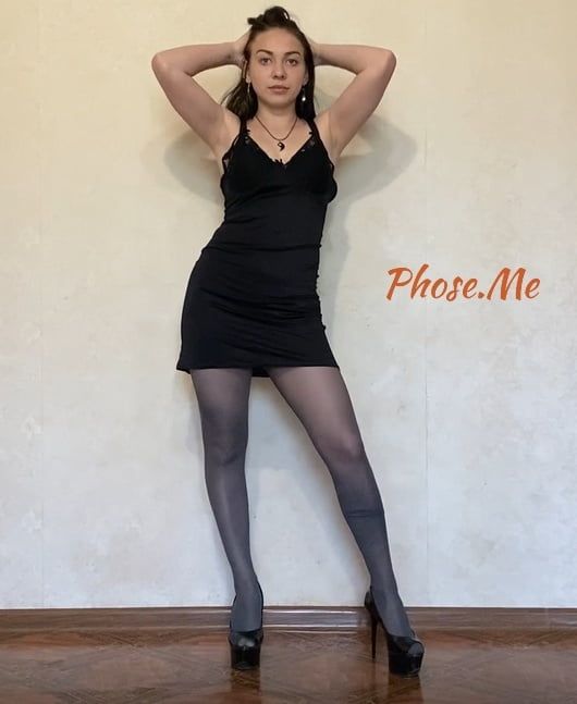 Amber In Black Dress and Grey Pantyhose and High Heels