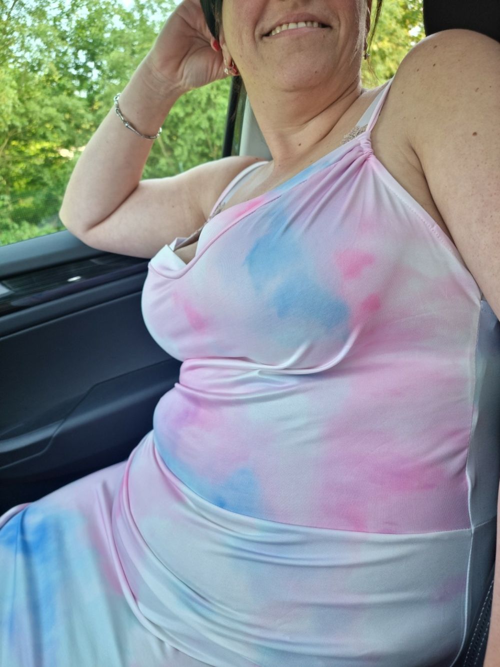 Busty milf showing her huge tits in car #2