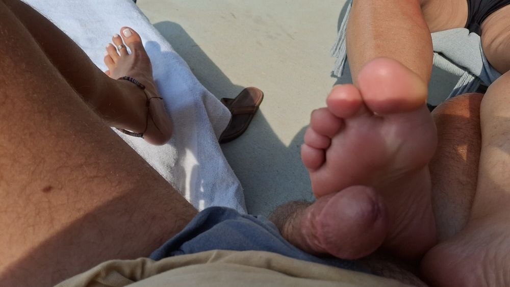 Playing footsie leads to a Foot job outside #15