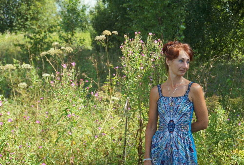 In blue dress in field #2