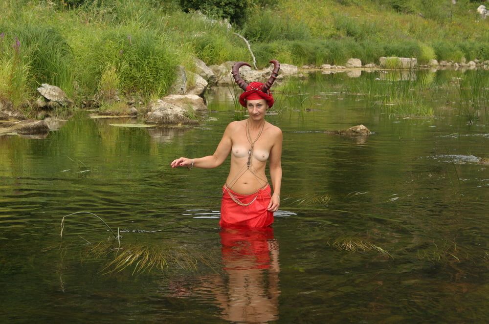 With Horns In Red Dress In Shallow River #19