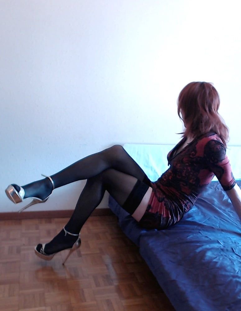 Sexy solo crossdresser (heels and lingerie)