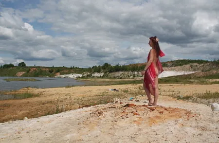 red shawl on white sand         