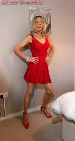    alessia travestita in flirty red dress         