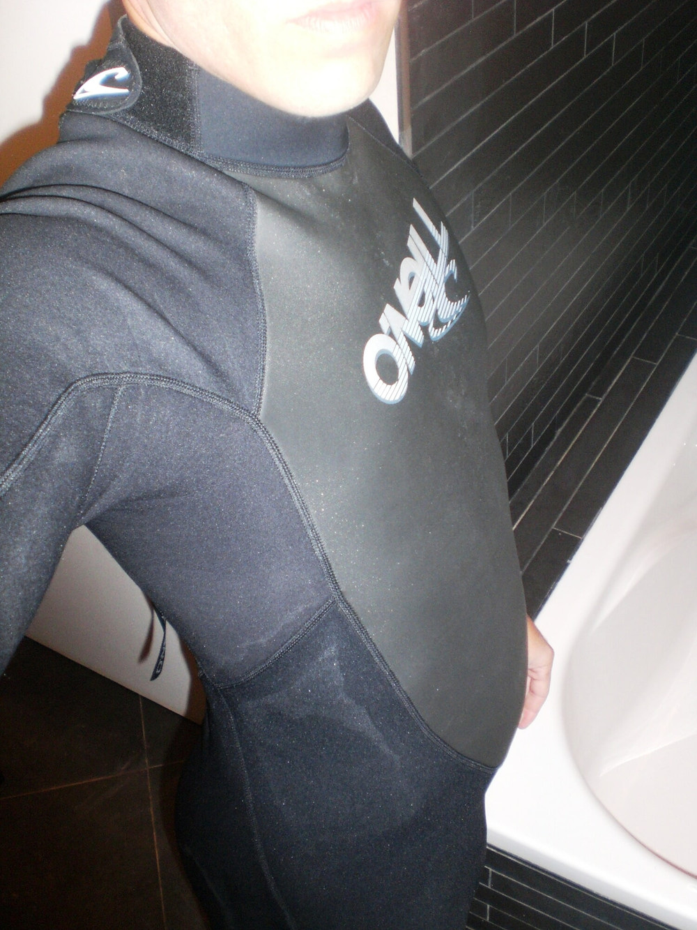 Wetsuit guy with hard uncut penis