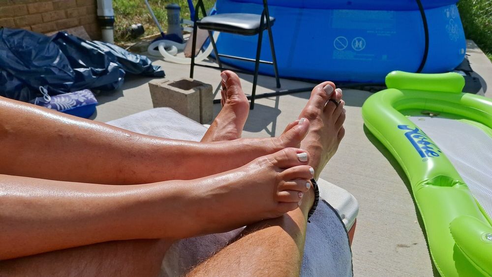 Tanning our legs and feet #11