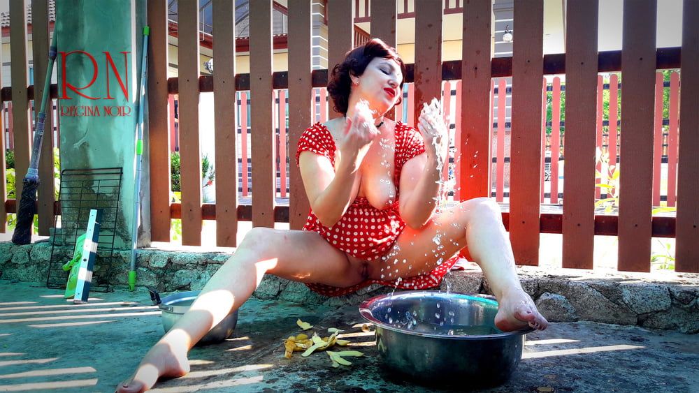 Retro maid prepares potatoes for dinner. Vintage performance