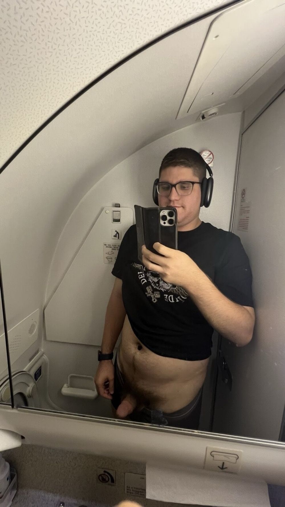 Naked in a airplane toilet