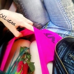 Red rose between white tits